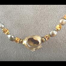 Collier de fouilles en or et perles fines